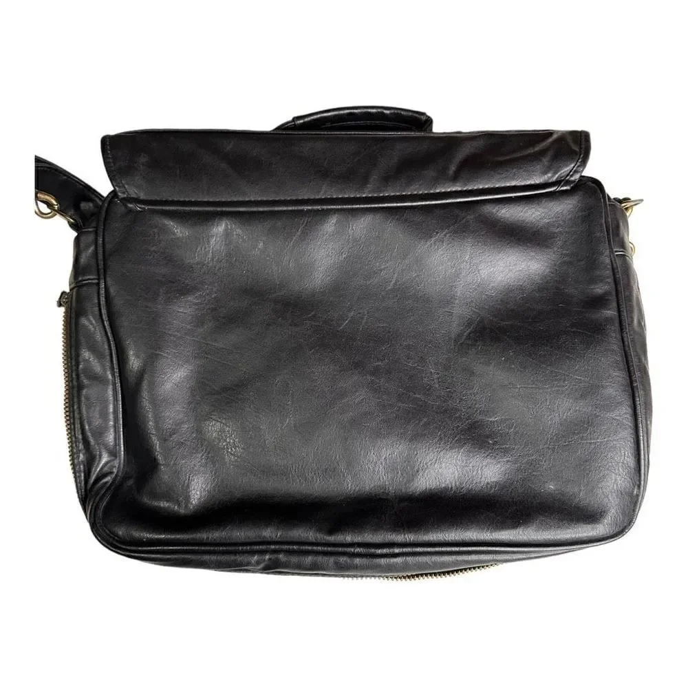 Large leather travel/work bag black with lots of pockets adjustable shoulder str